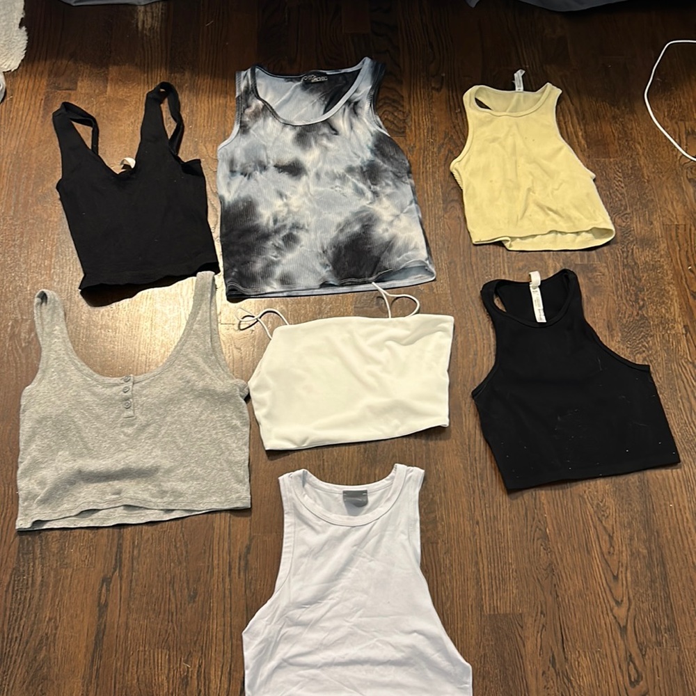 I’m selling 7 used tanks for $40